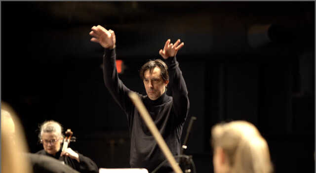 Orlando Cela, conducting the Lowell Chamber Orchestra. Photo by Adam Noya